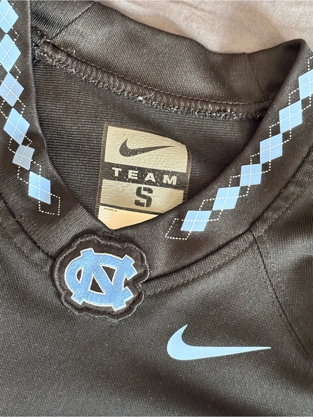 Nike Youth S North Carolina Tar Heels #12 Black Football Jersey UNC Argyle Trim